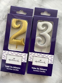 a set of gold and silver numbers in a package